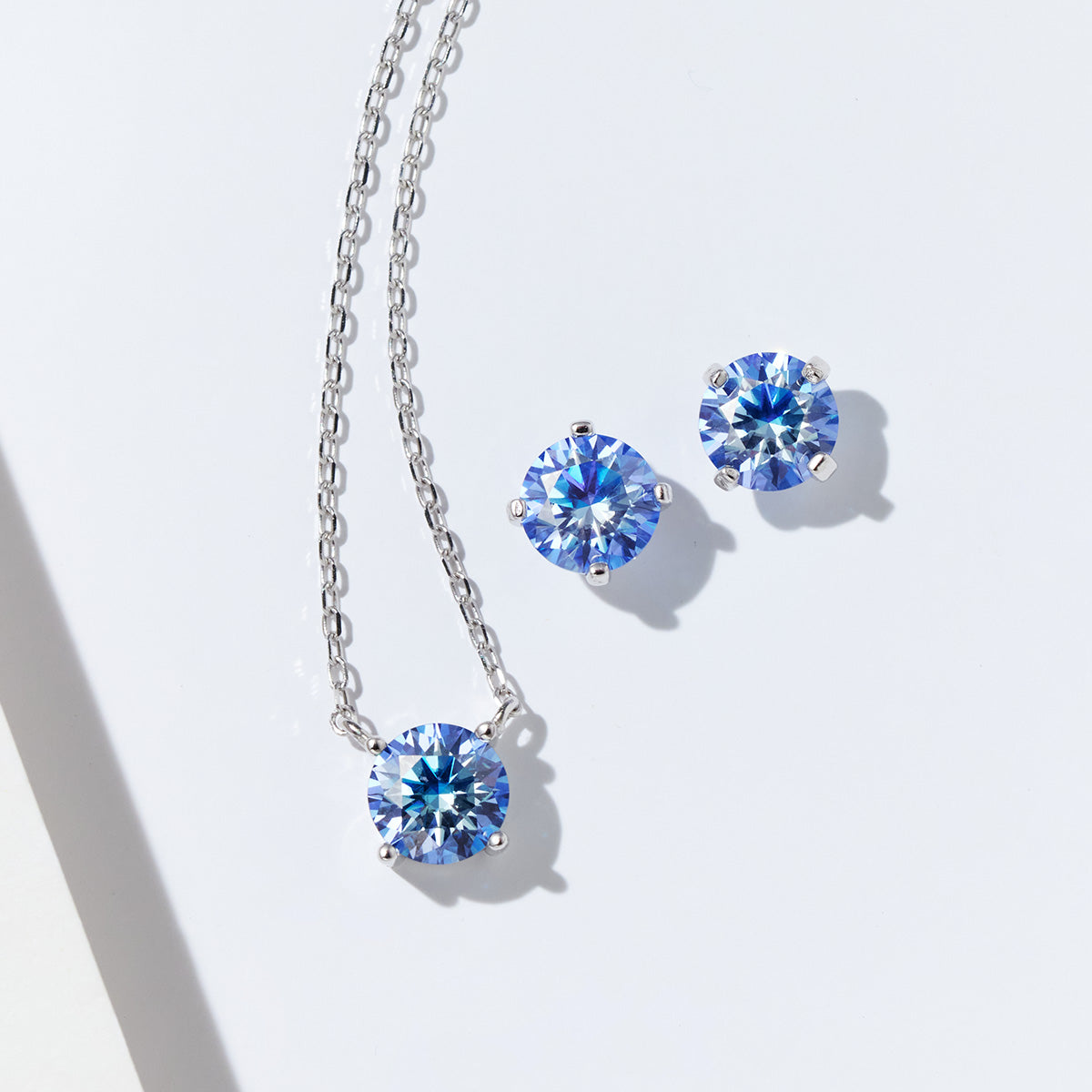 4-Prong Round Cut Moissanite Stud Earrings (2 ct. tw.) in 18K Gold Vermeil (3 Colors)