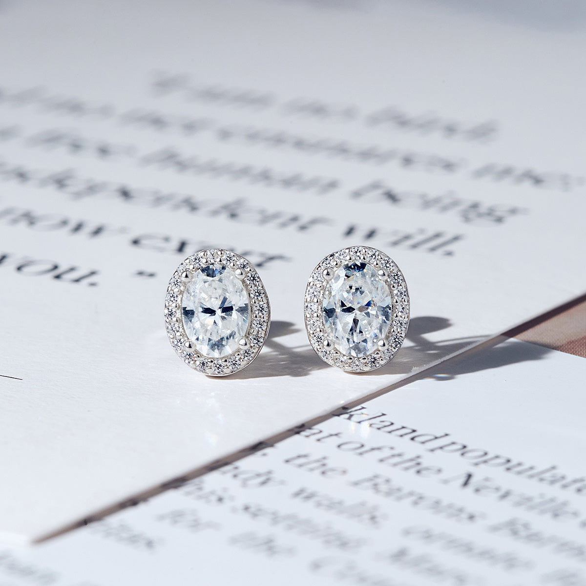 Oval Cut Moissanite Halo Stud Earrings (2 ct. tw.) in 18K Gold Vermeil